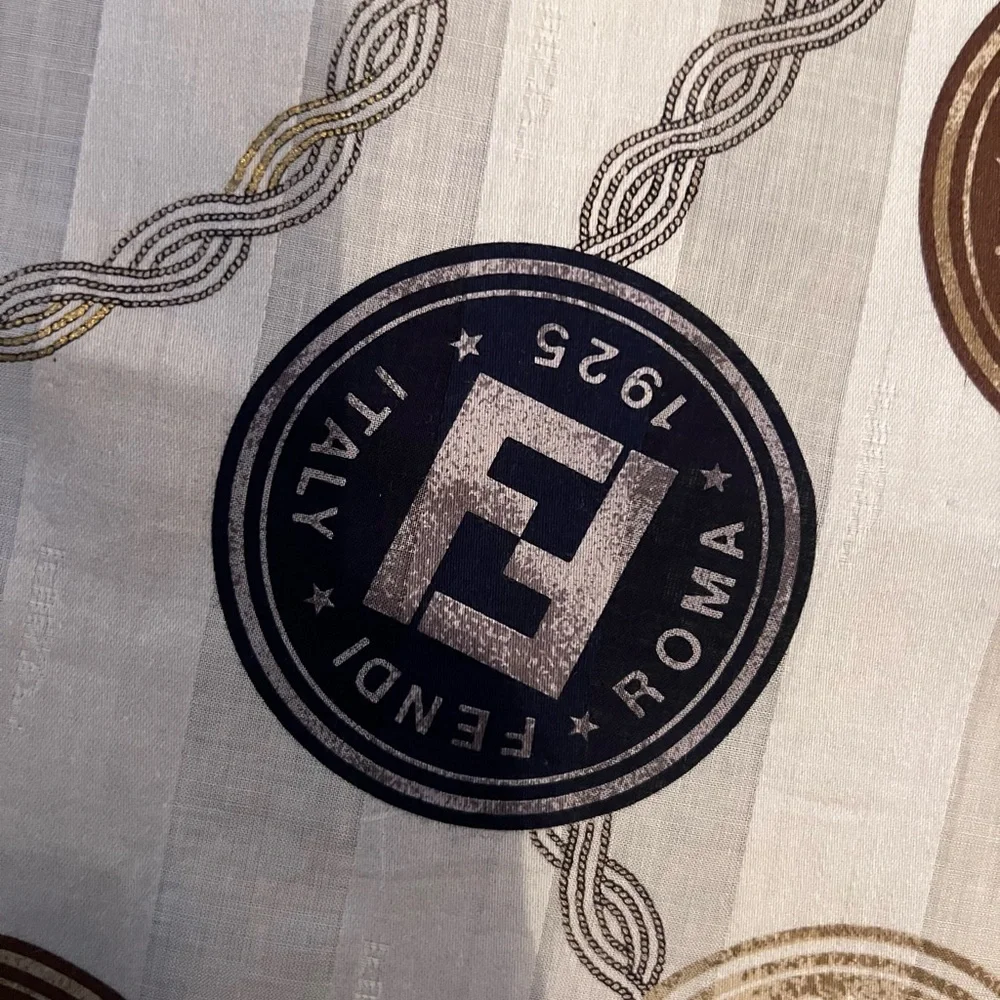 Fendi scarf 23 x 22.5” spend $400 get a free designer scarf valves at $400.